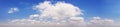 Wide sky panorama with scattered cumulus clouds Royalty Free Stock Photo