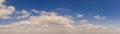 Wide sky panorama with scattered cumulus clouds Royalty Free Stock Photo