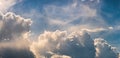 Wide sky panorama with scattered cumulus clouds bilding up before storm Royalty Free Stock Photo