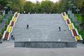 A wide staircase in front of the fountain in the Shevchenko park.