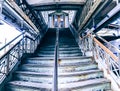 Wide staircase in subway station.