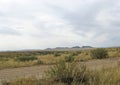 Wide steppe with yellow grass under a blue sky with white clouds Sayan mountains Siberia Russia Royalty Free Stock Photo