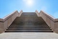 Wide stone staircase. Way up to blue sky in sunny day. Concept of hope and bright future Royalty Free Stock Photo