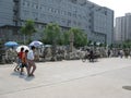 Wide street photo - Beijing Panjiayuan Statue Market