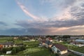 Wide summer panorama of new quiet residential suburban area. Lan