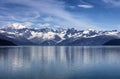 Wide view of Alaska Glacier bay landscape during late summer with ship going very close to the coastline Royalty Free Stock Photo