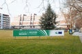 Wide view of Congress session signage banner in the large lawn of Council of