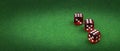 Wide view, Dice on green casino cloth, gambling background concept Royalty Free Stock Photo