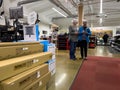 Kenmore, WA USA - circa December 2022: Wide view of elderly people shopping inside Kenmore Camera store