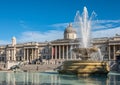 Wide view, Fountain and National Gallery on Trafalgar Square, London, UK