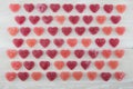 Wide View Grid of Dark Red and Pink Gummy Hearts