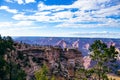 Wide view of groups of tourists at grand canyon Royalty Free Stock Photo