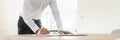 Wide view image of businessman signing a document Royalty Free Stock Photo