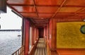 Wide view of interior of the wooden boat with the glimpse of the backwaters