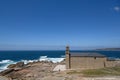Wide view of Lady of Barca sanctuary church on Muxia Galicia sea coast,camino de Santiago landmarks Royalty Free Stock Photo