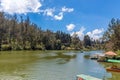 Wide view of lake with boats, beautiful tress in the background, Ooty, India, 19 Aug 2016