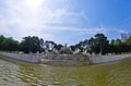 Wide view of Neptune fountain in front of Schenbrunn park and palace in Vienna