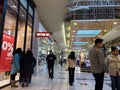 Lynnwood, WA USA - circa January 2023: Wide view of people shopping inside the Alderwood Mall