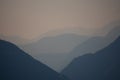 Wide view into a valley during sunset in the alps