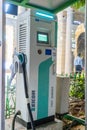 wideangle shot of exicom fast car charger with a pay and charge concept showing the growth of electric vehicles in India