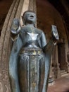 Wider low-angle photo of Laotian Buddha