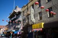 Wider view of red Chinese lanterns hanging over a street in Chinatown, San Francisco