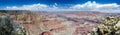Widescreen panorama shot of the Grand Canyon on a sunny day Royalty Free Stock Photo