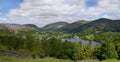 Widescreen view over Grasmere, it's lake and backgound mountains Royalty Free Stock Photo