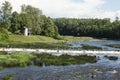 The widest waterfall and beach in Europe in Latvia Kuldiga. River Venta and flying fishes Royalty Free Stock Photo