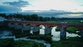 The Widest Waterfall in Europe in Latvia Kuldiga and Brick Bridge Across the River Venta in the Evening After Sunrise Royalty Free Stock Photo