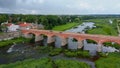 The Widest Waterfall in Europe in Latvia Kuldiga and Brick Bridge Across the River Venta in the Evening After Sunrise Royalty Free Stock Photo