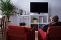 Widow sitting in living room Royalty Free Stock Photo