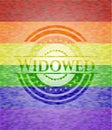 Widowed emblem on mosaic background with the colors of the LGBT flag