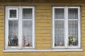 Widows in wooden building Royalty Free Stock Photo