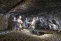 Wieliczka, Poland June 2, 2018: life-sized salt statues by the sculptor MieczysÃâaw Kluzek illustrate one of the oldest and the Royalty Free Stock Photo