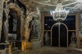 Wieliczka Salt Mine underground chamber with chandelier and statues made from salt near Krakow, Poland, tourist landmark Royalty Free Stock Photo