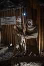 Wieliczka Salt Mine underground scene with miners near Krakow, Poland, tourist landmark