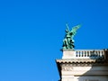 Wien/Austria - june 3 2019: Detail of a bronze sculpture of an angel on the top of a palace in Vienna Austria Royalty Free Stock Photo