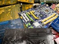 Wien/Austria - june 4 2019: pile of discarded computer mother boards sorted on a bin in a recycling and recovery compound in