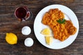 Wiener schnitzel with glass of red wine Royalty Free Stock Photo