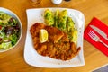 Wiener schnitzel with potatoes and lemon