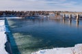 Wier over River in Winter