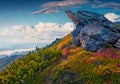 Wierd shape of big boulder on the edge of cliff in Carpathian mountains.