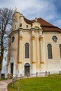 Wieskirche Pilgrimage Church with clody blue sky and green lawn in Bavaria Royalty Free Stock Photo