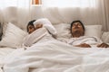 Wife can`t sleep Because the husband snores loudly on bedroom in morning. Royalty Free Stock Photo