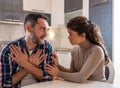 Wife comforting unhappy worried husband at home Royalty Free Stock Photo