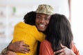 Wife And Daughter Embracing Happy Black Soldier Man After Returning Home Royalty Free Stock Photo