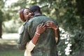 Wife embracing her military husband Royalty Free Stock Photo