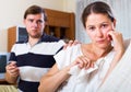 Wife with husband asking forgiveness Royalty Free Stock Photo