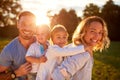 Wife and husband with children in nature Royalty Free Stock Photo